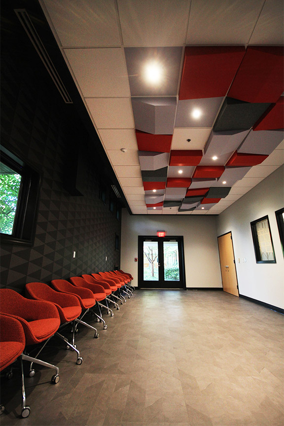 Space with chairs and patterned ceiling